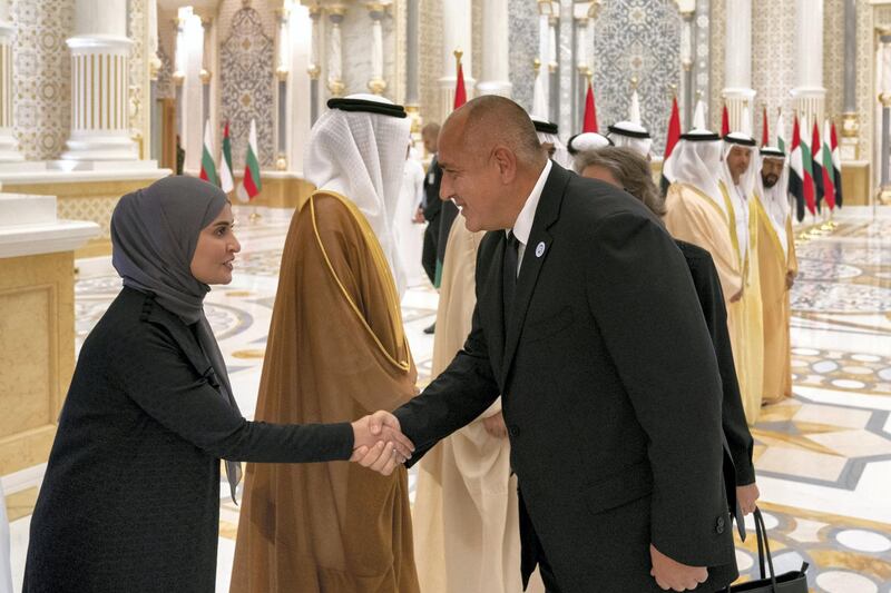 ABU DHABI, UNITED ARAB EMIRATES - October 21, 2018: HE Ohood Al Roumi, UAE Minister of State for Happiness and Wellbeing (L) greets HE Boyko Borissov, Prime Minister of Bulgaria (R), during a reception at the Presidential Palace. 

( Hamad Al Kaabi / Crown Prince Court - Abu Dhabi )
---