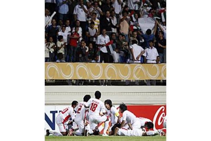 UAE players celebrate after Ahmed Khalil's magnificent first-half free-kick against Honduras at the Alexandrial Stadium which gave them a 1-0 victory.