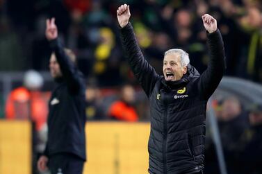 epa07234150 Dortmund's head coach Lucien Favre (R) celebrates during the German Bundesliga soccer match between Borussia Dortmund and Werder Bremen in Dortmund, Germany, 15 December 2018. EPA/FRIEDEMANN VOGEL CONDITIONS - ATTENTION: The DFL regulations prohibit any use of photographs as image sequences and/or quasi-video.