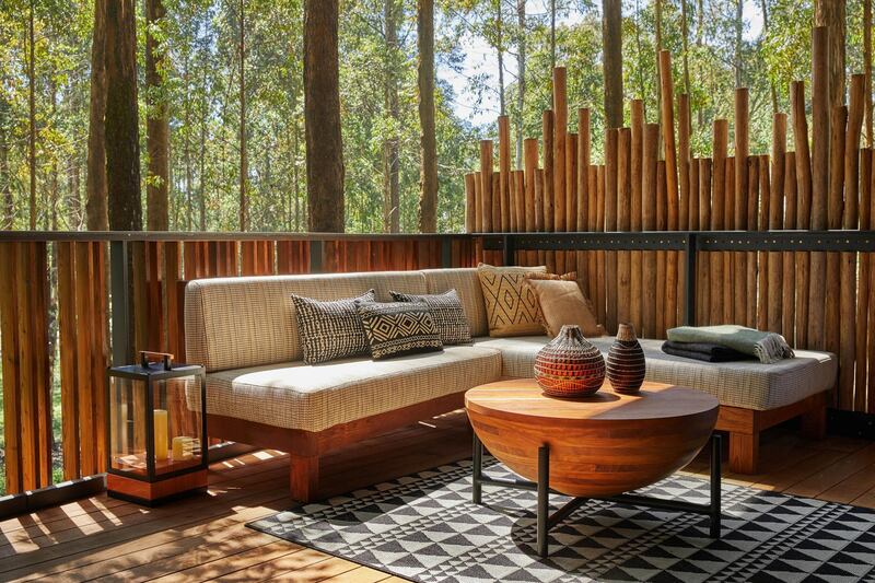Private viewing decks surrounded by a eucalyptus forest are an ideal place to relax and soak in the beauty of nature in this Rwandan hideaway. 