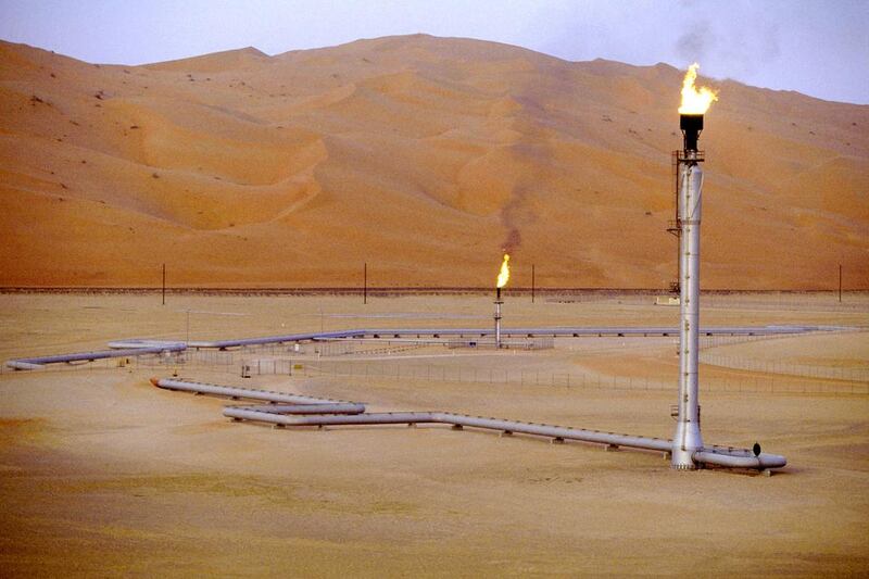 Flare stacks burn at the Saudi Aramco oilfield complex at Shaybah in the Rub’ Al Khali desert. Gulf-based state oil exporters such as Saudi Aramco and the UAE's Abu Dhabi National Oil Company are making huge bets on developing blue hydrogen as they look to sell newer forms of energy. Getty Images