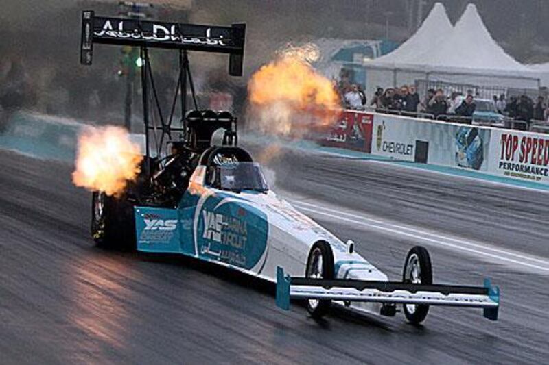 One of the 8,000 horsepower Top Fuel Dragster starts a run during the Drag Racing Festival at Yas Marina yesterday.