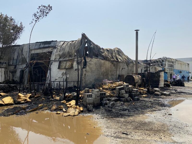 Six warehouses were destroyed after fire broke out in an industrial area in Ajman. Courtesy Ajman Civil Defence