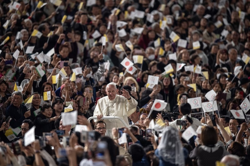 Pope Francis drives around Tokyo Dome before conducting mass during a visit to Japan in November 2019. Getty Images