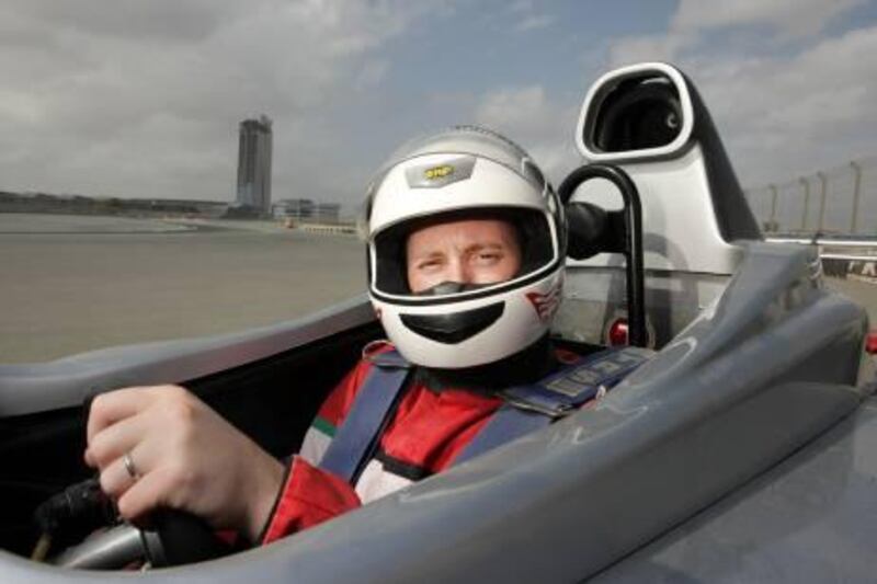 UAE - Dubai - Nov 30 - 2011: Steven McCombe pose for a portrait  after racing on a track for the ?rst time at Dubai Autodrome. ( Jaime Puebla - The National Newspaper )