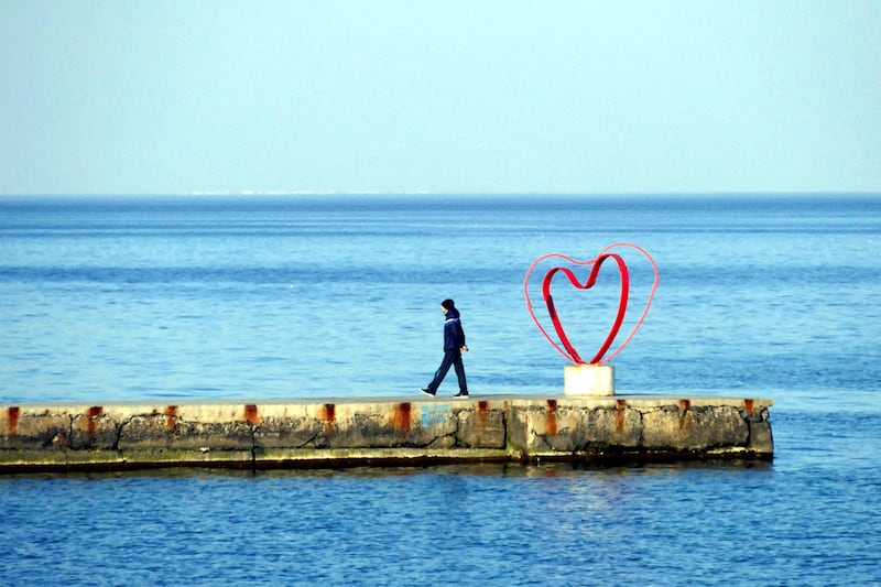 Amid the Ukraine war, there's time for a seaside stroll in Odesa. Reuters