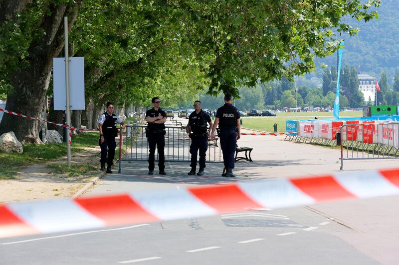 French police secure the area after several children and an adult were injured in a knife attack in Annecy, France. Reuters