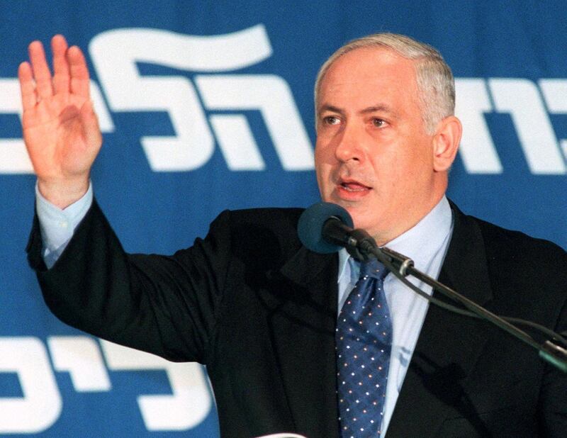 Outgoing Israeli Prime Minister Benjamin Netanyahu announces his resignation from the Israeli parliament, the Knesset, during a meeting of the Likud Party central committee in Tel Aviv, 27 May 1999. Netanyahu had earlier stepped down as head of the Likud following his, 17 May 1999, election defeat to Ehud Barak. (Photo by ZVIKA TISHLER-YEDIOTH / AFP)