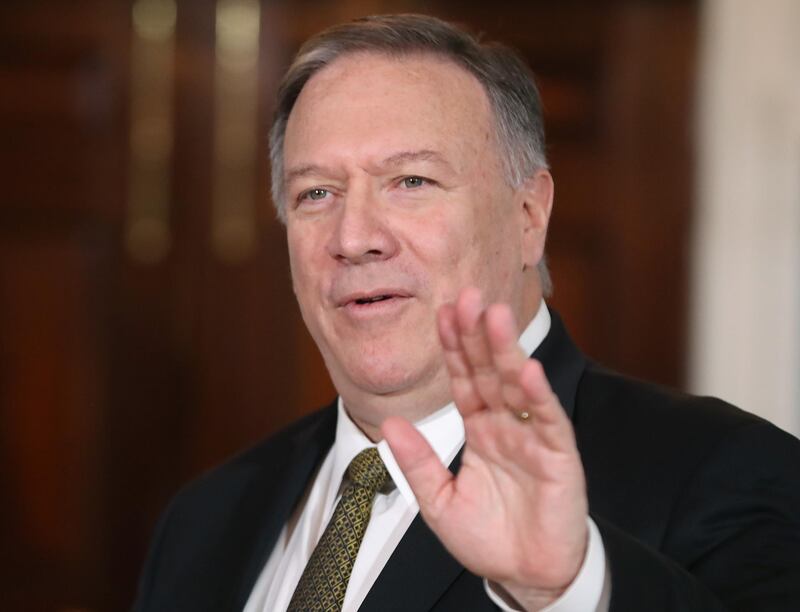 WASHINGTON, DC - NOVEMBER 14: U.S. Secretary of State Mike Pompeo waves while meeting with NATO Secretary General Jens Stoltenberg during the Global Coalition to Defeat ISIS conference, at the State Department, on November 14, 2019 in Washington, DC.   Mark Wilson/Getty Images/AFP
== FOR NEWSPAPERS, INTERNET, TELCOS & TELEVISION USE ONLY ==
