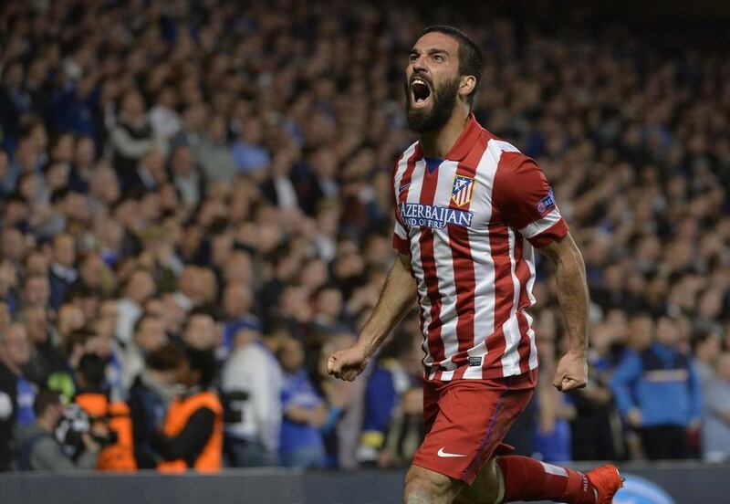 Atletico Madrid midfielder Arda Turan celebrates after scoring a goal against Chelsea during their Champions League victory on Wednesday. Toby Melville / Reuters / April 30, 2014