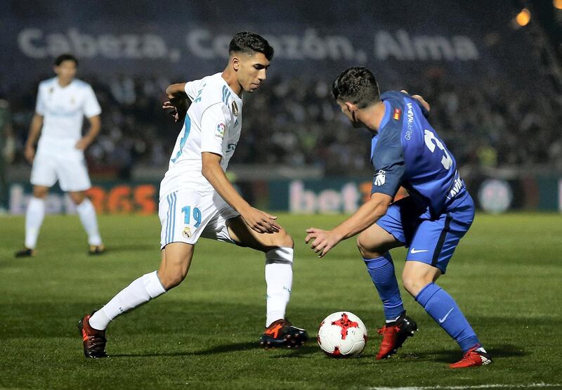 MADRID, SPAIN - OCTOBER 26:  Achraf Hakimi of Real Madrid is challenged by Fran Garcia of Fuenlabrada during the Copa del Rey round of 32 first leg match between Fuenlabrada and Real Madrid CF at Estadio Fernando Torres on October 26, 2017 in Fuenlabrada, near Madrid, Spain.  (Photo by Angel Martinez/Real Madrid via Getty Images)