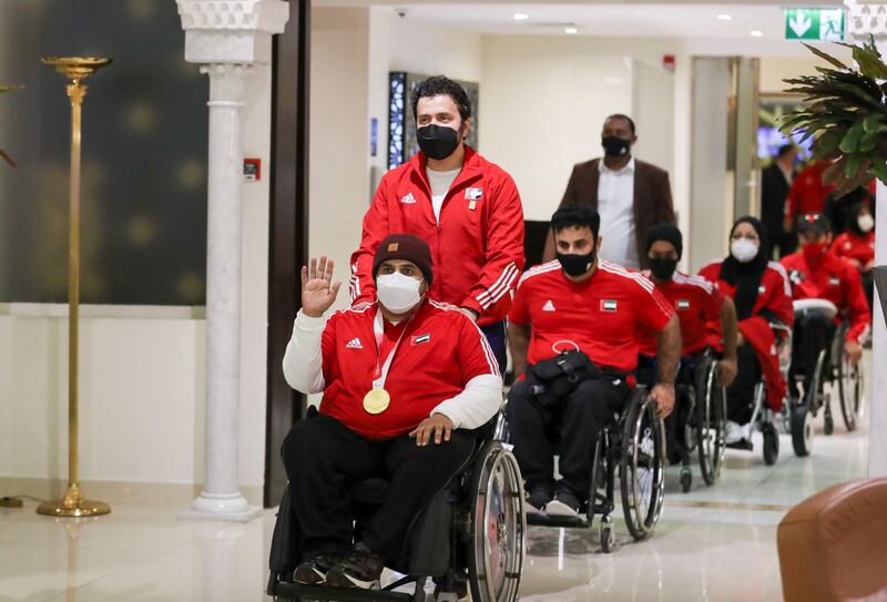 The UAE Paralympic team arrives at Abu Dhabi International Airport on Monday, September 6, 2021 after competing at the 2020 Tokyo Paralympics. All photos Khushnum Bhandari / The National