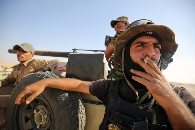 Shiite fighters from the Hashed Al Shaabi, or Popular Mobilization Forces, arrive at an area south of Mosul on October 22, 2016. Ahmad Al Rubaye/AFP