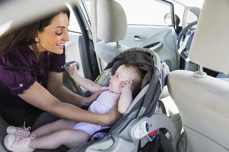 Fitting a car seat is a motoring necessity for parents. iStockphoto.com 
