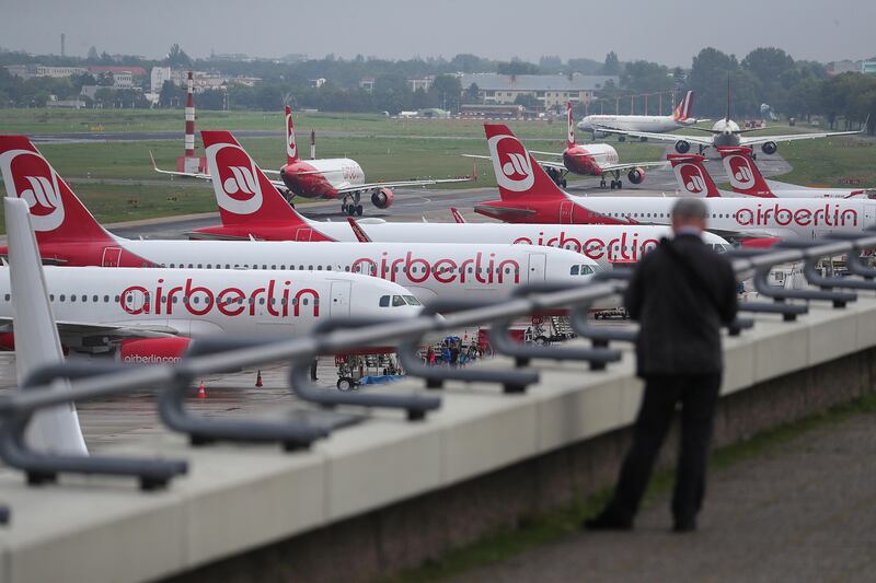 Passenger aircraft, operated by Air Berlin Plc, stand on the tarmac at Tegel airport in Berlin, Germany, on Wednesday, Aug. 16, 2017. Air Berlin filed for insolvency after leading shareholder Etihad Airways PJSC withdrew its financial support, marking the second failure of a major European airline in four months after the Persian Gulf carrier pulled the plug on funding Italy’s Alitalia SpA in May. Photographer: Krisztian Bocsi/Bloomberg