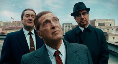 This image released by Netflix shows, from left, Robert De Niro, Al Pacino and Ray Romano in a scene from "The Irishman." On Monday, Jan. 13 Pacino was nominated for an Oscar for best supporting actor for his role in the film. (Netflix via AP)