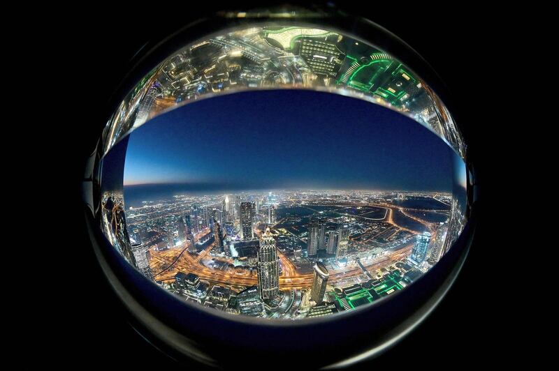 A fish-eye lens view of Dubai's skyline as seen from the Burj Khalifa, the world's tallest building at 828 metres. AFP