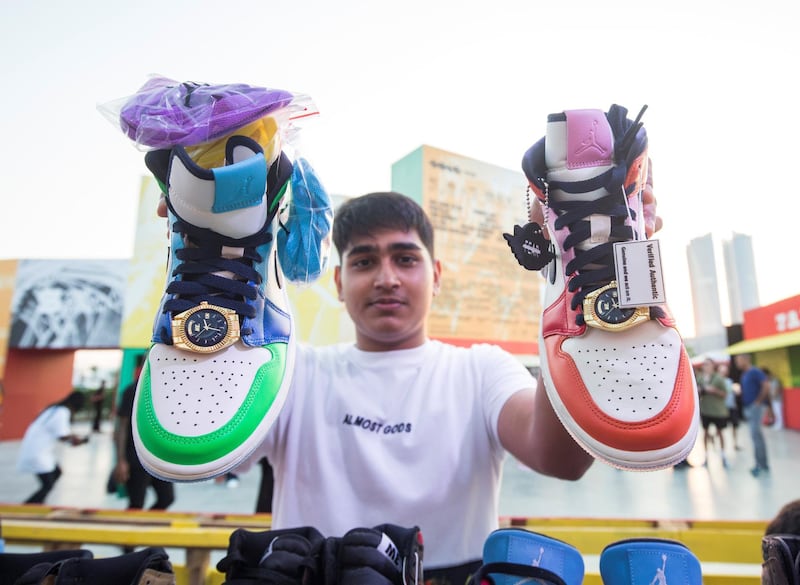 Dubai, United Arab Emirates-  A man showing shoes at the Sole Dubai Festival at D3.  Leslie Pableo for The National for Saeed Saeed's story
