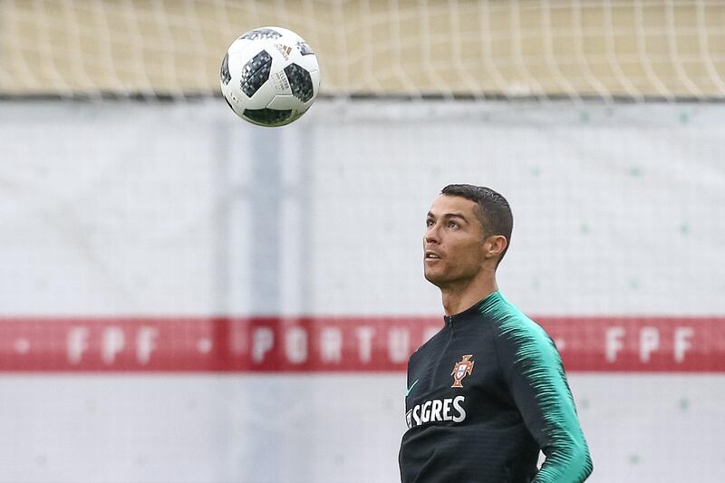 epa06803917 Portugal national team player Cristiano Ronaldo during a training session at the Kratovo training camp, which will be the team base camp during the FIFA World Cup 2018 in Russia, Ramensky, Moscow, Russia, 13 June 2018.  EPA/PAULO NOVAIS