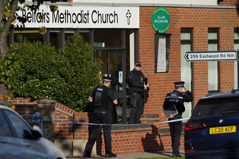 Armed police officers at the scene near the Belfairs Methodist Church, where Conservative MP Sir David Amess died after he was stabbed several times at a constituency surgery. PA