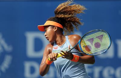 Naomi Osaka of Japan returns the ball to Anett Kontaveit of Estonia during the Dubai Duty Free Tennis Championship in Dubai, United Arab Emirates, Wednesday, Feb. 21, 2018. (AP Photo/Kamran Jebreili)