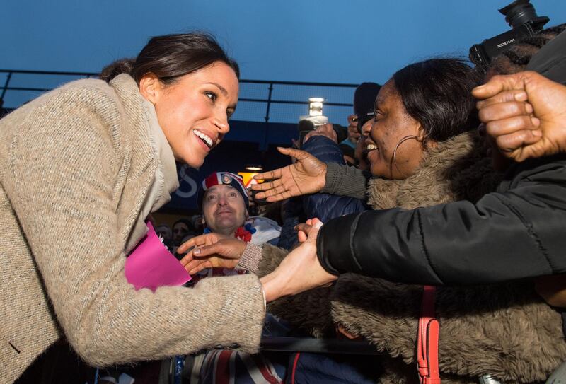LONDON, ENGLAND - JANUARY 09: Meghan Markle meets members of the public following a visit to Reprezent 107.3FM in Pop Brixton on January 9, 2018 in London, England. The Reprezent training programme was established in Peckham in 2008, in response to the alarming rise in knife crime, to help young people develop and socialise through radio. (Photo by Dominic Lipinski - WPA Pool/Getty Images)
