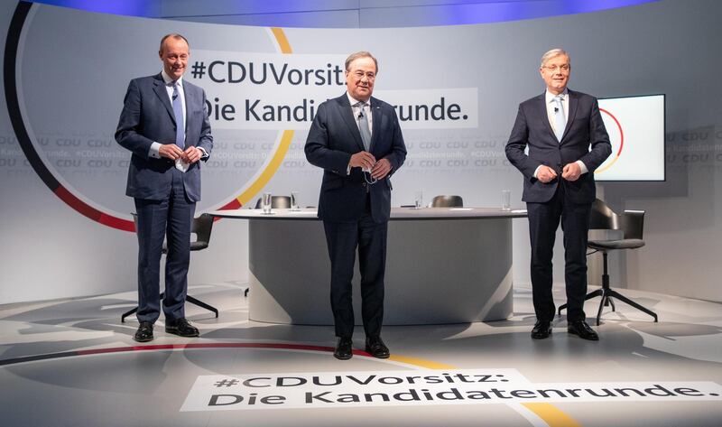 epa08927101 Candidates for chairman of Germany's Christian Democratic Union (CDU) party, (L-R) Norbert Roettgen, Armin Laschet, and  Friedrich Merz, during a discussion among candidates at the CDU party headquarters in Berlin, Germany, 08 January 2021. A CDU party congress is held on 15 and 16 January in digital format at which a new party chairman is to be elected.  EPA/Andreas Gora / POOL