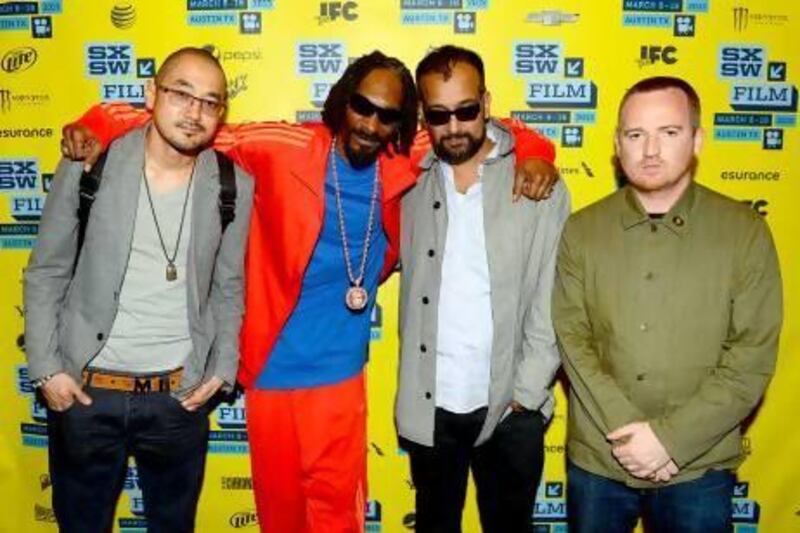 From left, Ted Chung, Snoop Lion, Suroosh Alvi and Andy Capper attend the Reincarnated screening at the 2013 SXSW festival in Austin, Texas. Mark Davis / Getty Images for SXSW / AFP