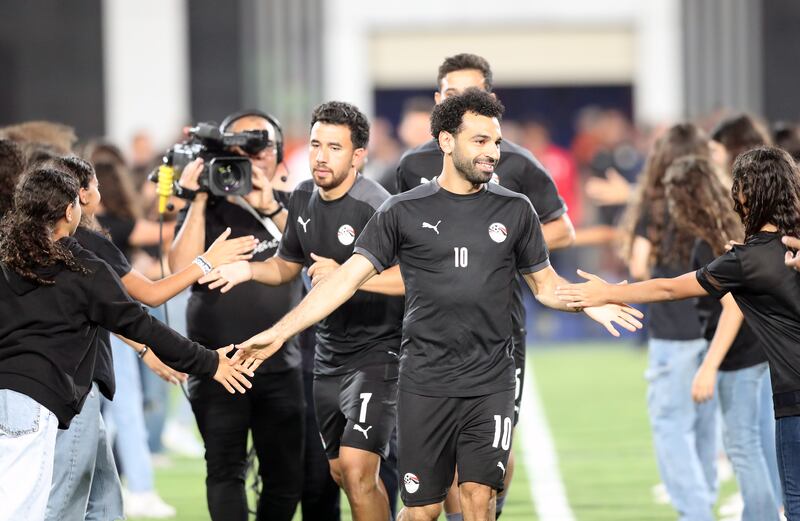 Egypt's Mohamed Salah is greeted before the Africa Cup of Nations (AFCON) qualifying soccer match between Egypt and Guinea in Cairo, Egypt. EPA