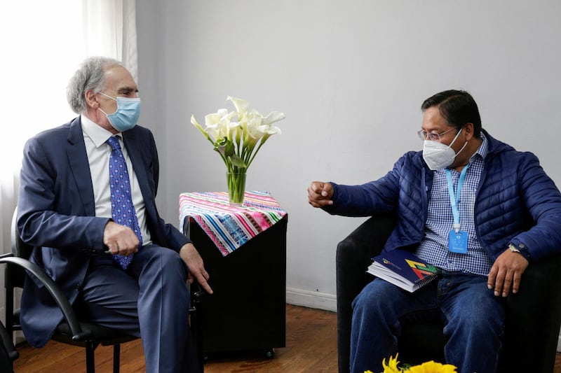 FILE PHOTO: Jean Arnault, Personal Envoy of the Secretary of the United Nations for Bolivia meets with Luis Arce, Presidential candidate for Movement to Socialism party (MAS), in La Paz, Bolivia, October 16, 2020.REUTERS/David Mercado/File Photo