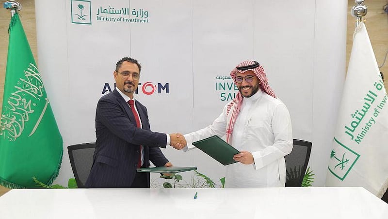 An official from Saudi Arabia's Ministry of Investment and an Alstom executive after the signing ceremony. SPA