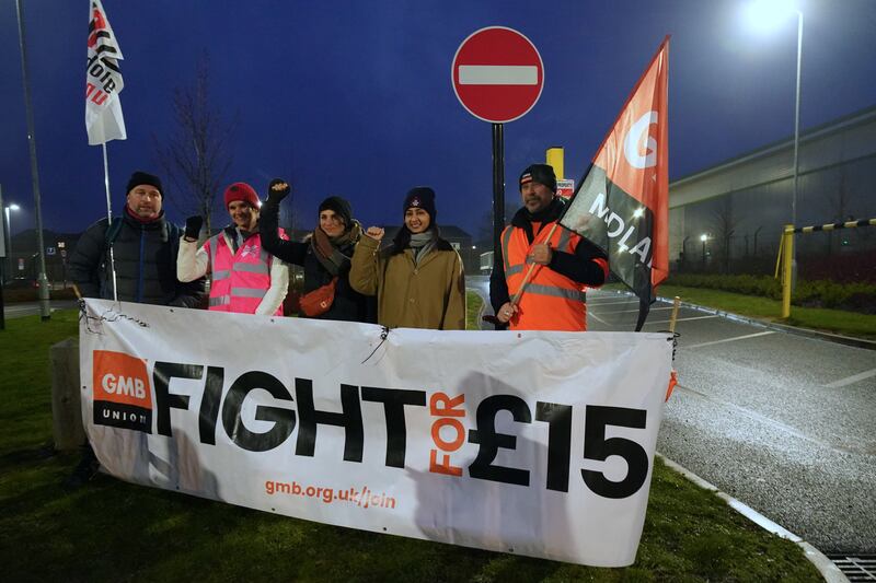 Members of the GMB union on the picket line in Coventry. PA