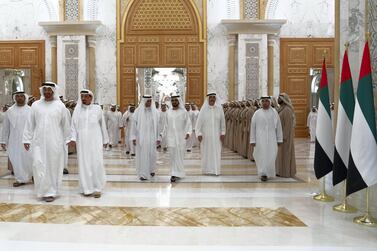 ABU DHABI, UNITED ARAB EMIRATES - May 08, 2019: (L-R) HH Sheikh Mohamed bin Zayed Al Nahyan, Crown Prince of Abu Dhabi and Deputy Supreme Commander of the UAE Armed Forces, HH Sheikh Humaid bin Rashid Al Nuaimi, UAE Supreme Council Member and Ruler of Ajman, HH Sheikh Hamad bin Mohamed Al Sharqi, UAE Supreme Council Member and Ruler of Fujairah, HH Sheikh Mohamed bin Rashid Al Maktoum, Vice-President, Prime Minister of the UAE, Ruler of Dubai and Minister of Defence and HH Sheikh Saud bin Rashid Al Mu'alla, UAE Supreme Council Member and Ruler of Umm Al Quwain, attend an iftar reception at Qasr Al Watan. ( Eissa Al Hammadi for Ministry of Presidential Affairs ) ---