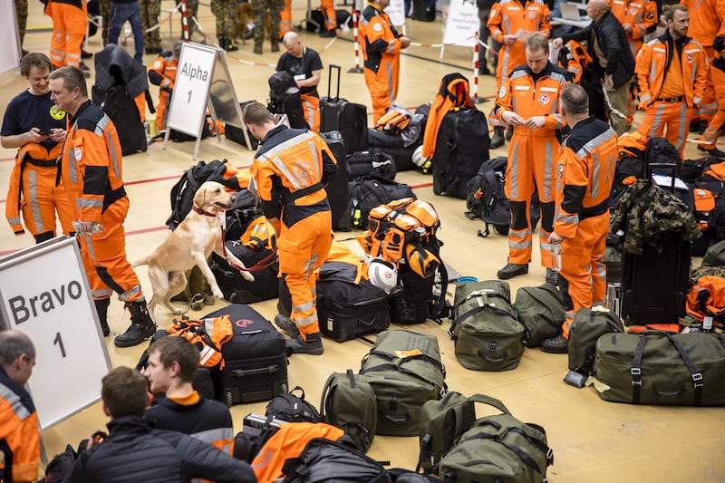 Swiss team with rescue dogs at Zurich Airport. EPA