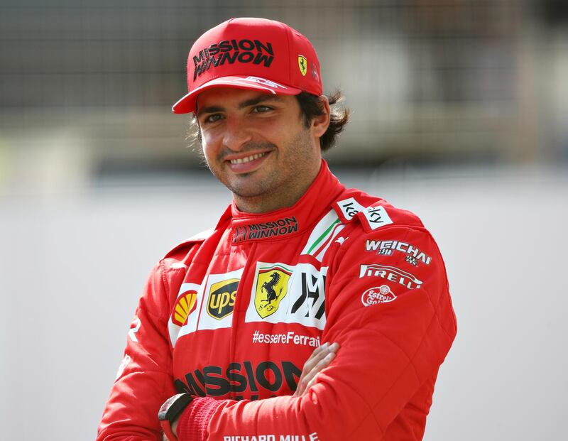 BAHRAIN, BAHRAIN - MARCH 12: Carlos Sainz of Spain and Ferrari looks on from the grid during Day One of F1 Testing at Bahrain International Circuit on March 12, 2021 in Bahrain, Bahrain. (Photo by Joe Portlock/Getty Images)