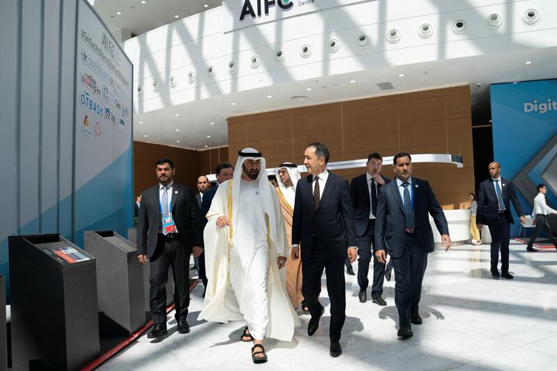 ASTANA, KAZAKHSTAN - July 05, 2018: HH Sheikh Mohamed bin Zayed Al Nahyan, Crown Prince of Abu Dhabi and Deputy Supreme Commander of the UAE Armed Forces (2nd L) tours the Astana International Financial Centre.

( Hamad Al Kaabi / Crown Prince Court - Abu Dhabi )