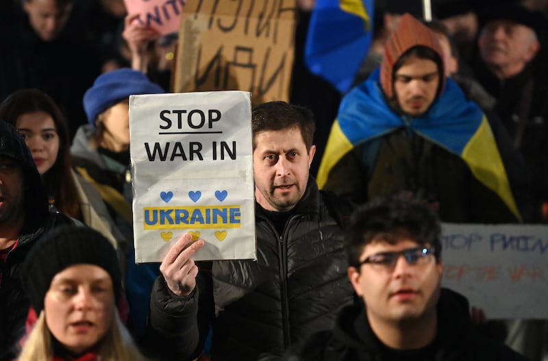 Ukrainians in London's Trafalgar Square protest against the war. EPA