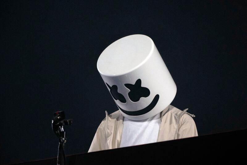 Marshmello is the stage persona of Christopher Comstock, famous for wearing a white helmet that resembles a marshmallow. AFP
