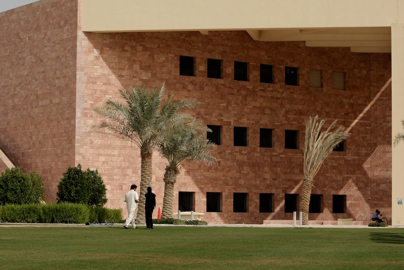 DOHA, QATAR - February 17, 2009: Students walk on the grounds of the Texas A & M University in the Qatar Foundation, Education City in Doha, Qatar. Currently Northwestern University shares space at this campus, while its own campus is being built. (Ryan Carter / The National)stock, and story by Daniel Bardsley *** Local Caption ***  RC001-DohaEducationCity.jpgRC001-DohaEducationCity.jpg