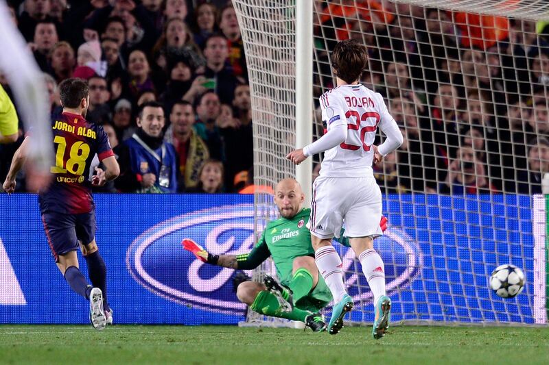 Barcelona's defender Jordi Alba, left, scores their fourth goal past Milan's goalkeeper Christian Abbiati, center, during the Champions League round of 16 second leg soccer match between FC Barcelona and AC Milan at Camp Nou stadium, in Barcelona, Spain, Tuesday, March 12, 2013. (AP Photo/Manu Fernandez) *** Local Caption ***  Spain Soccer Champions League.JPEG-020b1.jpg