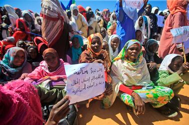 Sudanese women protest during a visit by the country's prime minister at camp for internally displaced people in El-Fasher, the capital of North Darfur state, in November. AFP