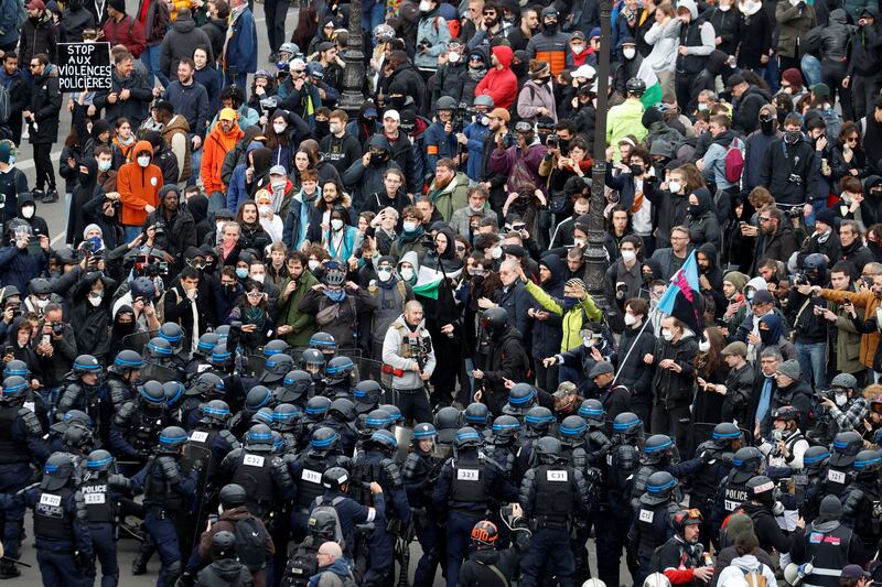 French riot police face off against protesters on the Place de la Bastille. Reuters