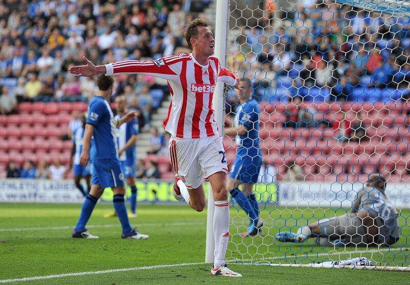 WIGAN, ENGLAND - SEPTEMBER 01:  Peter Crouch of Stoke City celebrates scoring his side's second goal during the Barclays Premier League match between Wigan Athletic and Stoke City at DW Stadium on September 1, 2012 in Wigan, England.  (Photo by Chris Brunskill/Getty Images) *** Local Caption ***  151106779.jpg