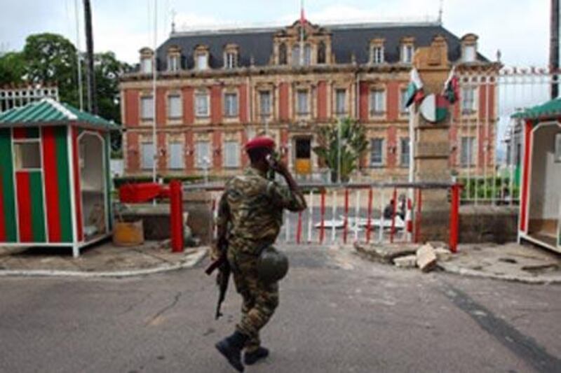 Madagascan soldiers loyal to opposition leader Andry Rajoelina guard the presidential palace in Antananarivo on March 17, 2009 after the army seized the office of Madagascan President Marc Ravalomanana on March 16.