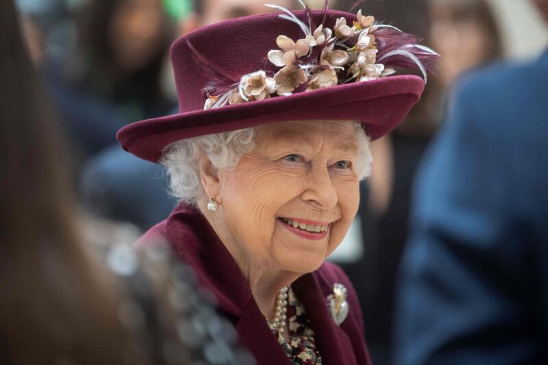 Queen Elizabeth II talks with MI5 officers during her visit to the headquarters of MI5, Britain's domestic security agency, at Thames House in London on February 25, 2020. AFP