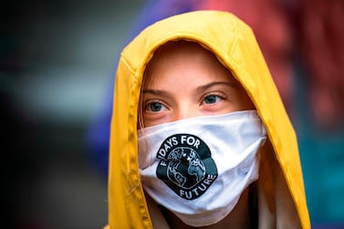 Swedish climate activist Greta Thunberg during a "Fridays for Future" protest in front of the Swedish Parliament Riksdagen in Stockholm on October 9. Jonathan Nackstrand/ AFP