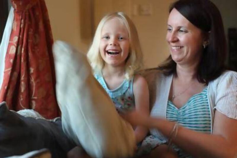 Five year-old Breah D'Arcy and her mother Elaine. Breah has successfully battled cancer after she was diagnosed with leukaemia in late 2010. Delores Johnson / The National