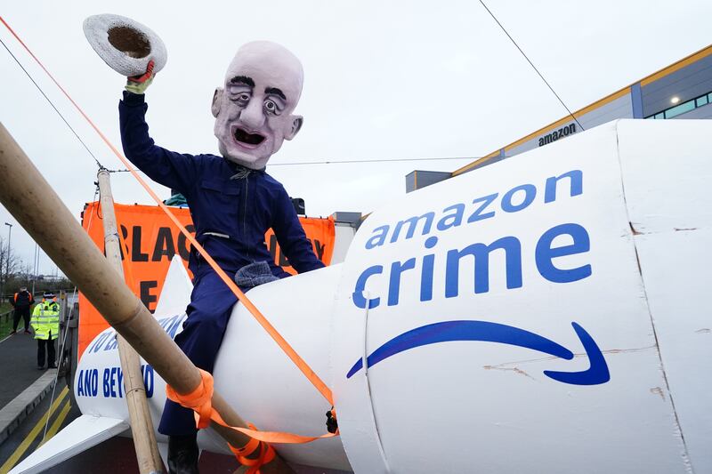 Activists from Extinction Rebellion blocked the entrance to the Amazon fulfilment centre in Tilbury, Essex, preventing lorries from entering or leaving on "Black Friday", the retailer's busiest day of the year. PA