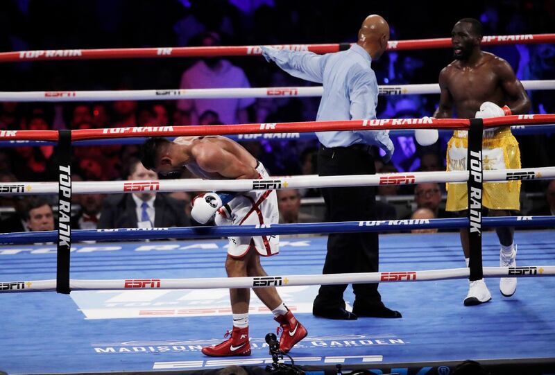 Amir Khan after a low blow shot by Terence Crawford. Reuters