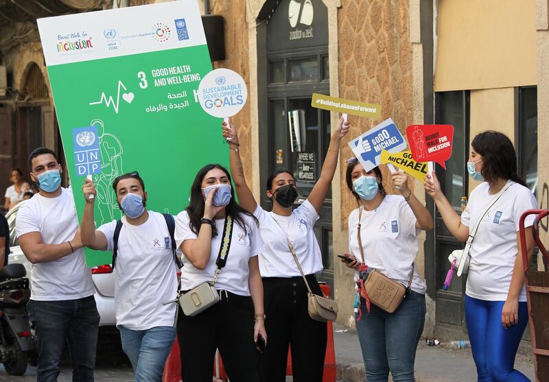 UNDP staff welcome the UNDP Regional Goodwill Ambassador for Climate Action Michael Haddad during his 4-km walk to raise awareness of the initiative and mobilise resources for it in Beirut, Lebanon.  EPA